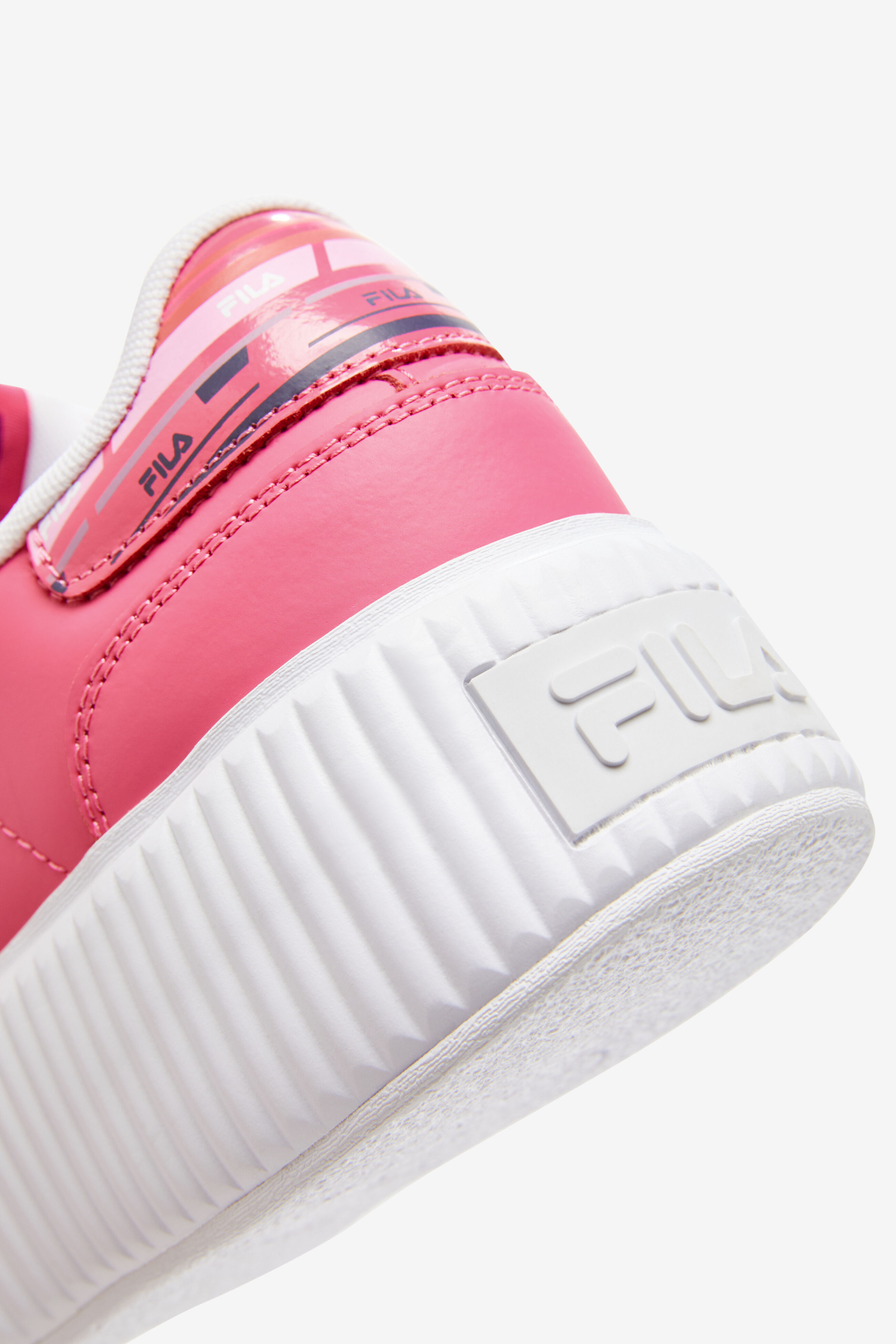 Shiny pink fila trainers sale