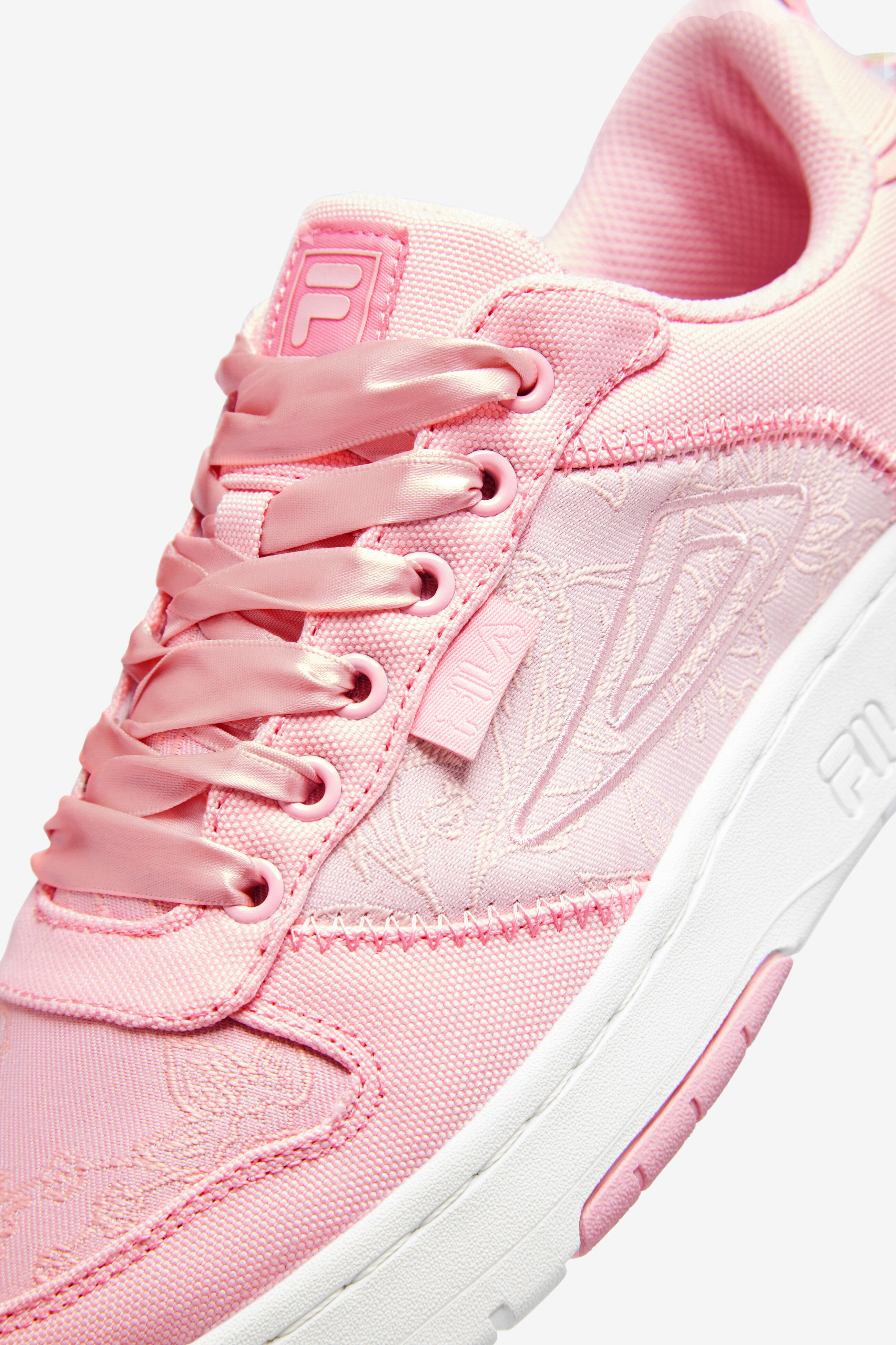 Pink flower fila shoes sales