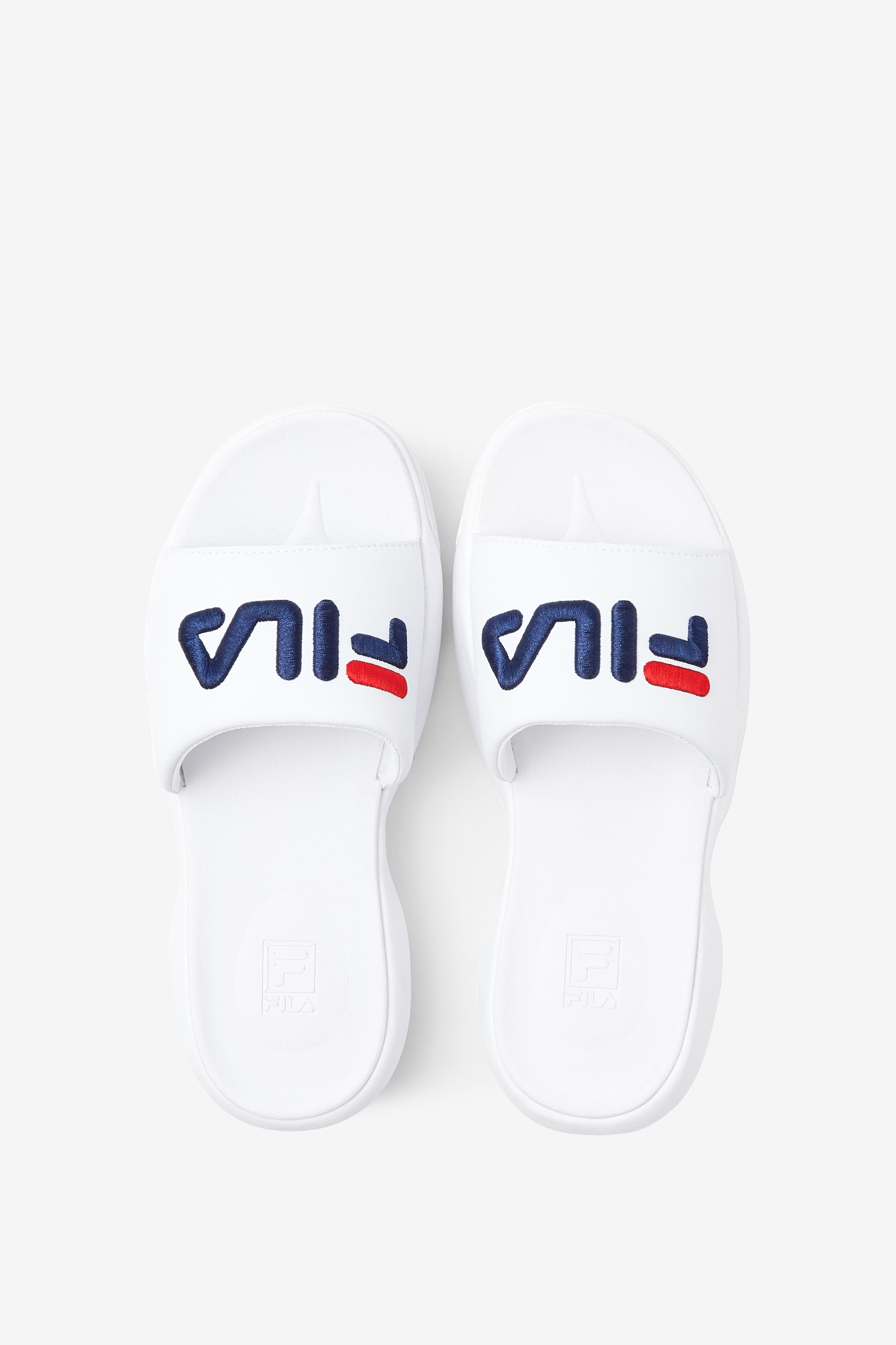 white fila slides