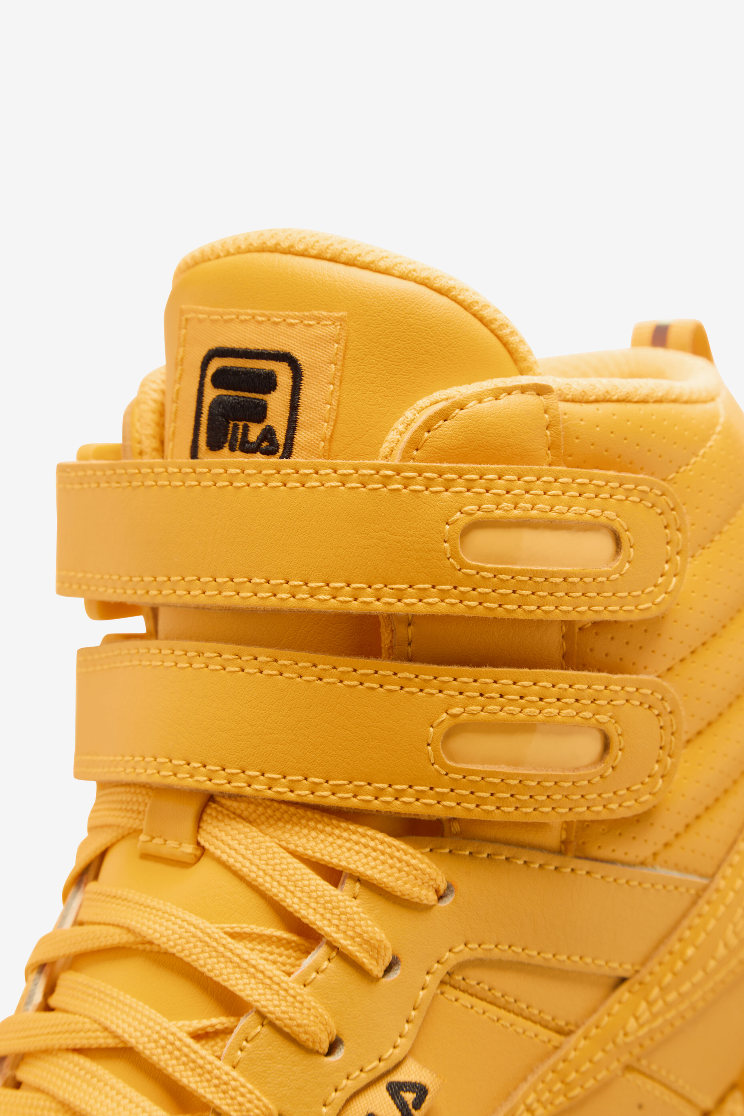 Yellow fila hot sale high tops