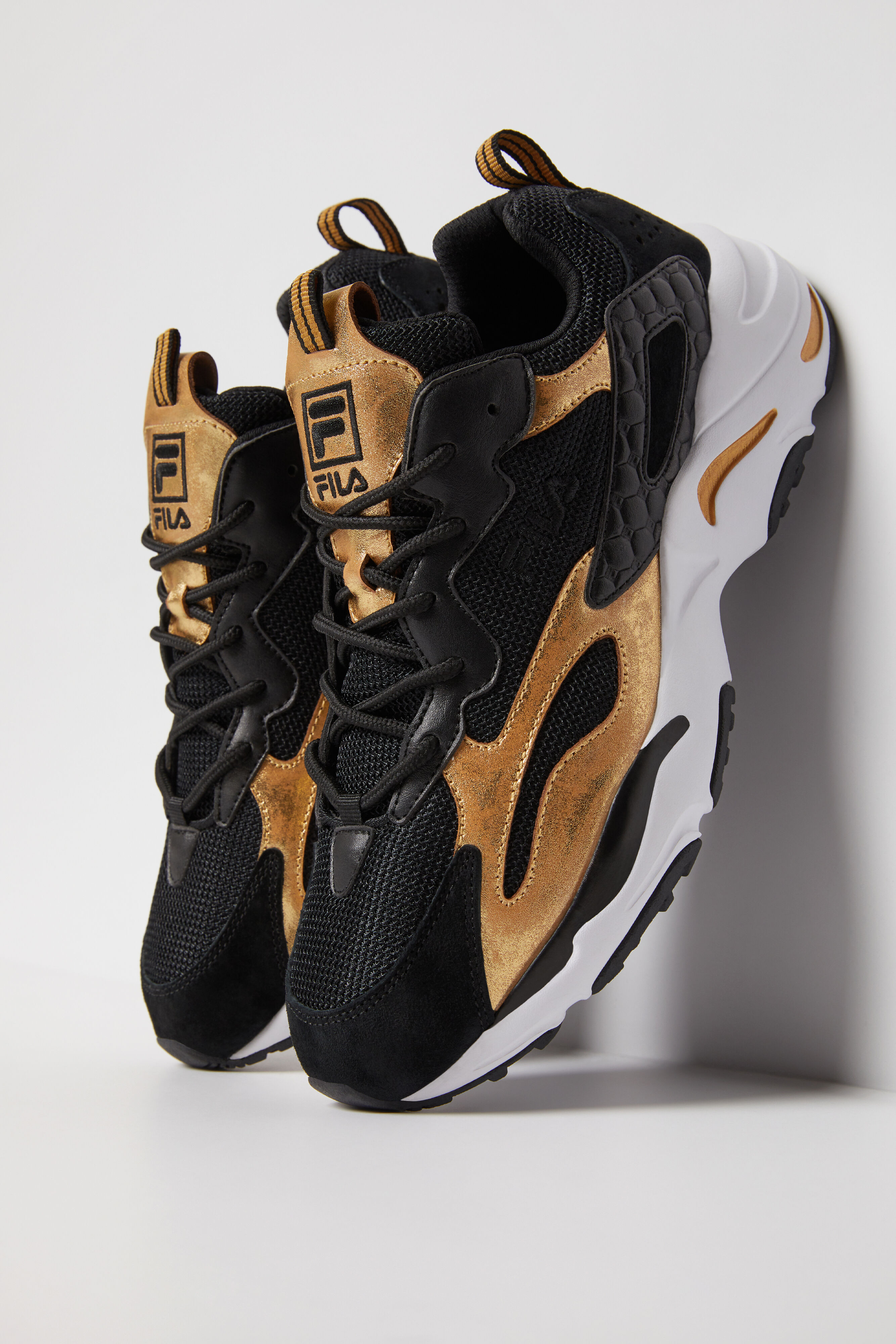 Fila black 2025 and gold sneakers