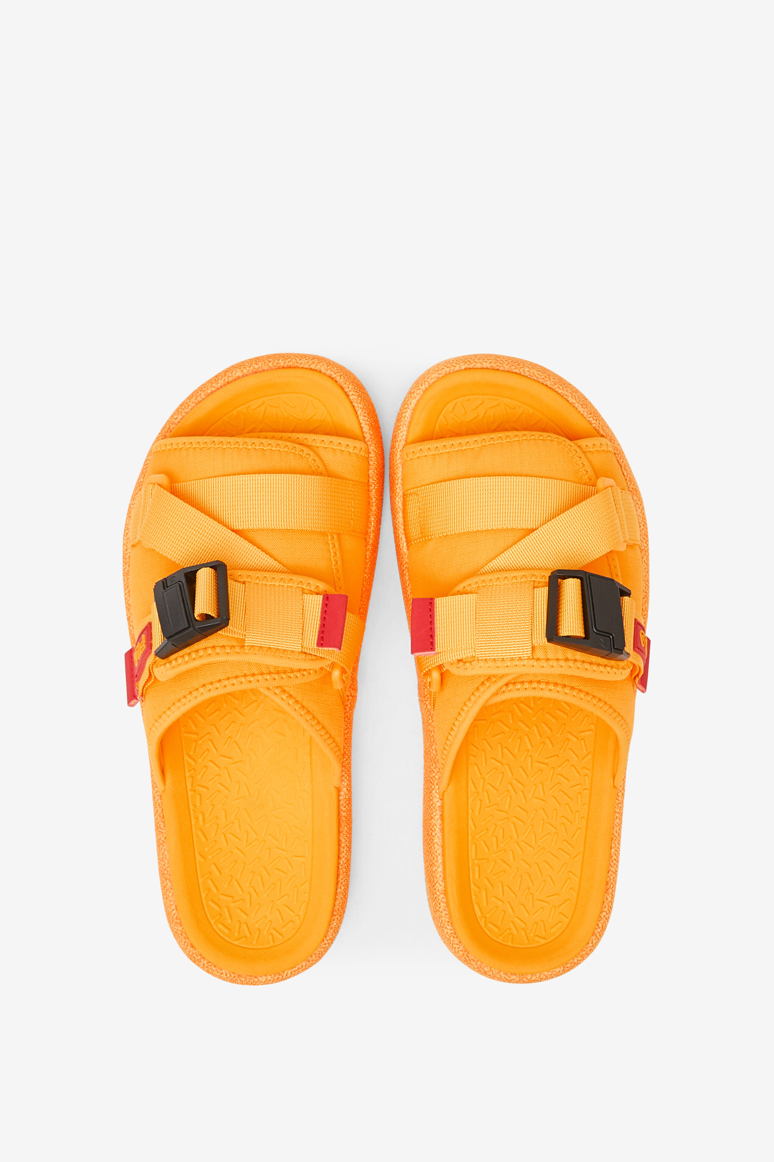Orange fila slides hotsell