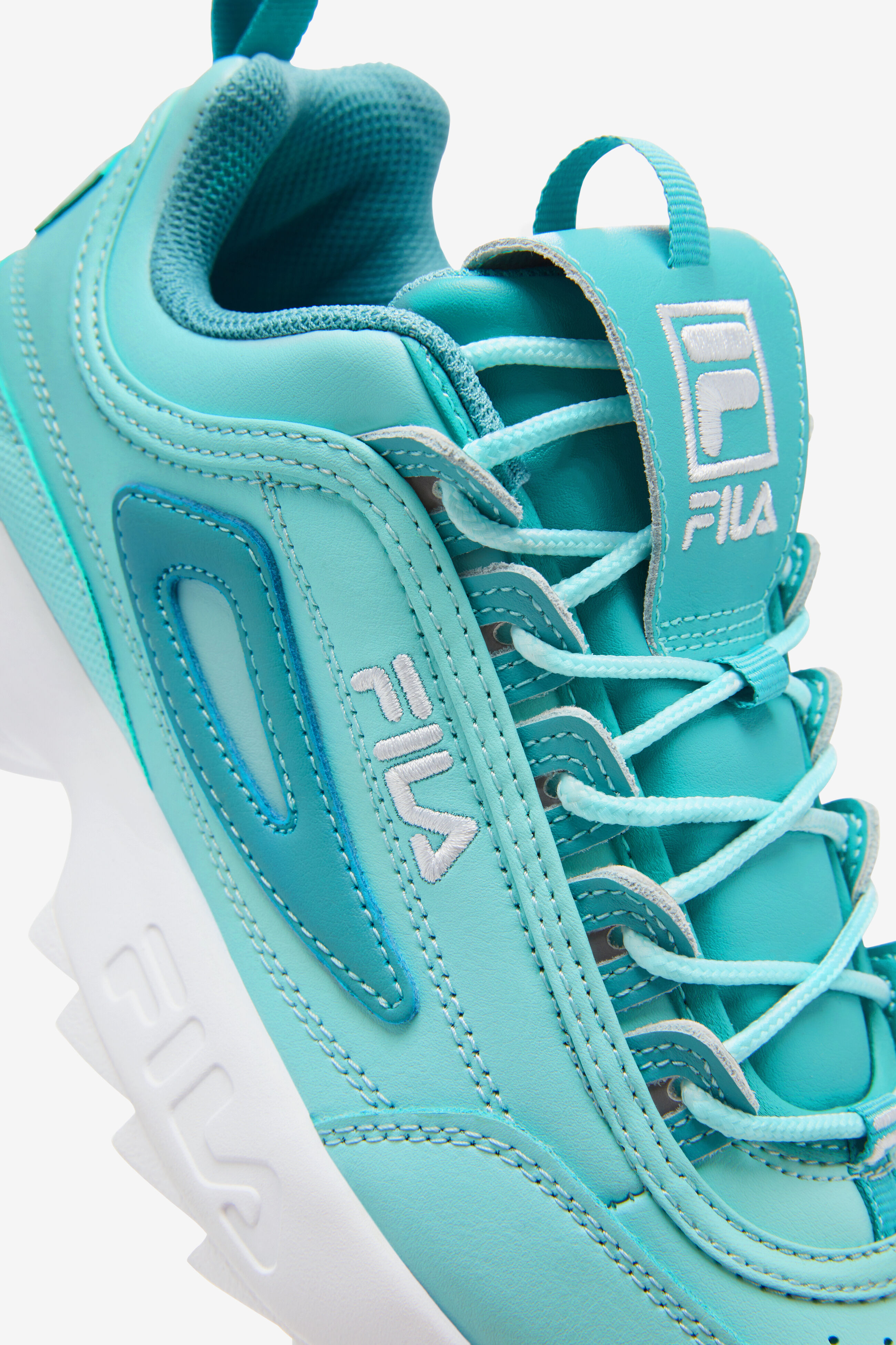 Turquoise shop fila shoes