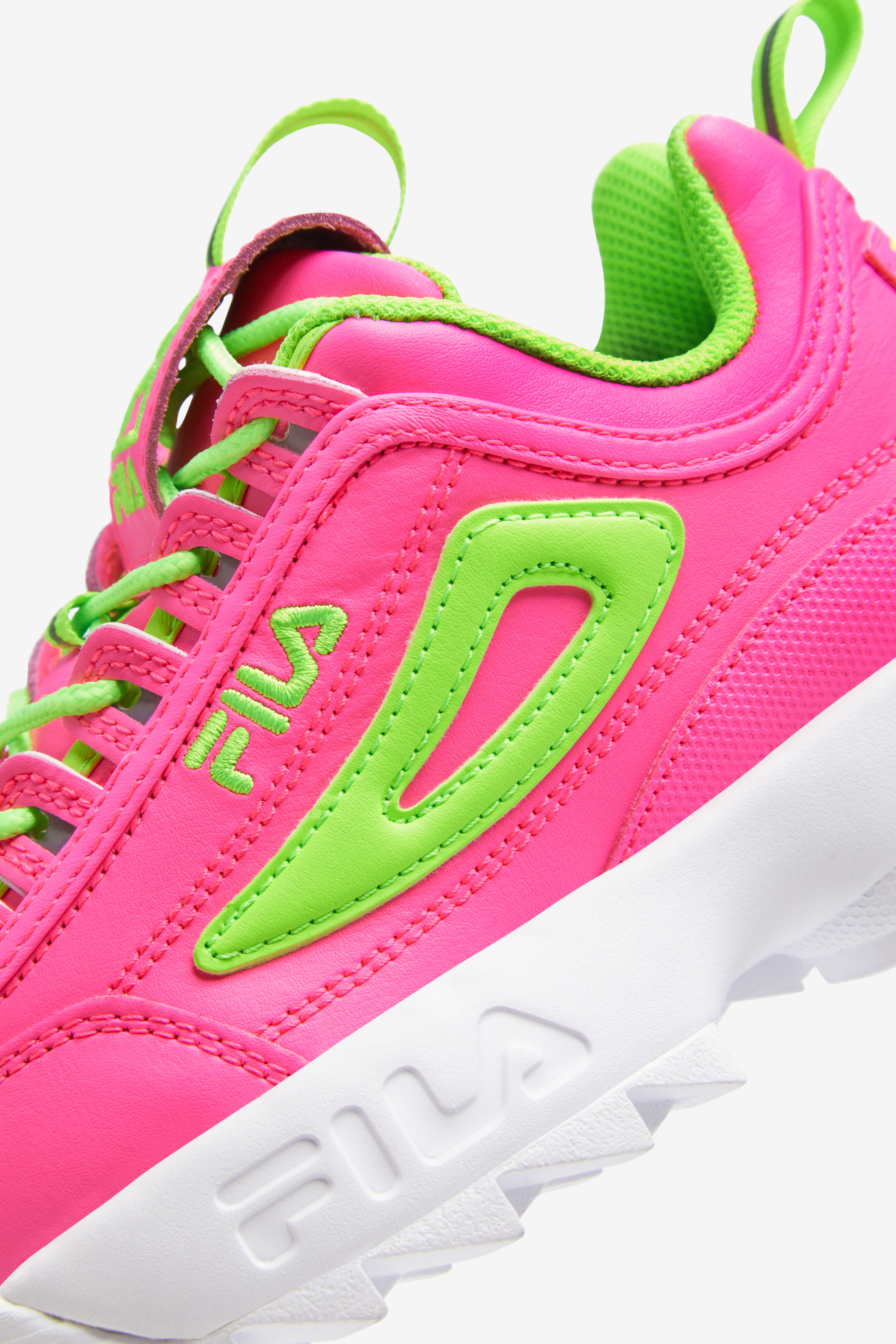 Pink and green fila shoes top