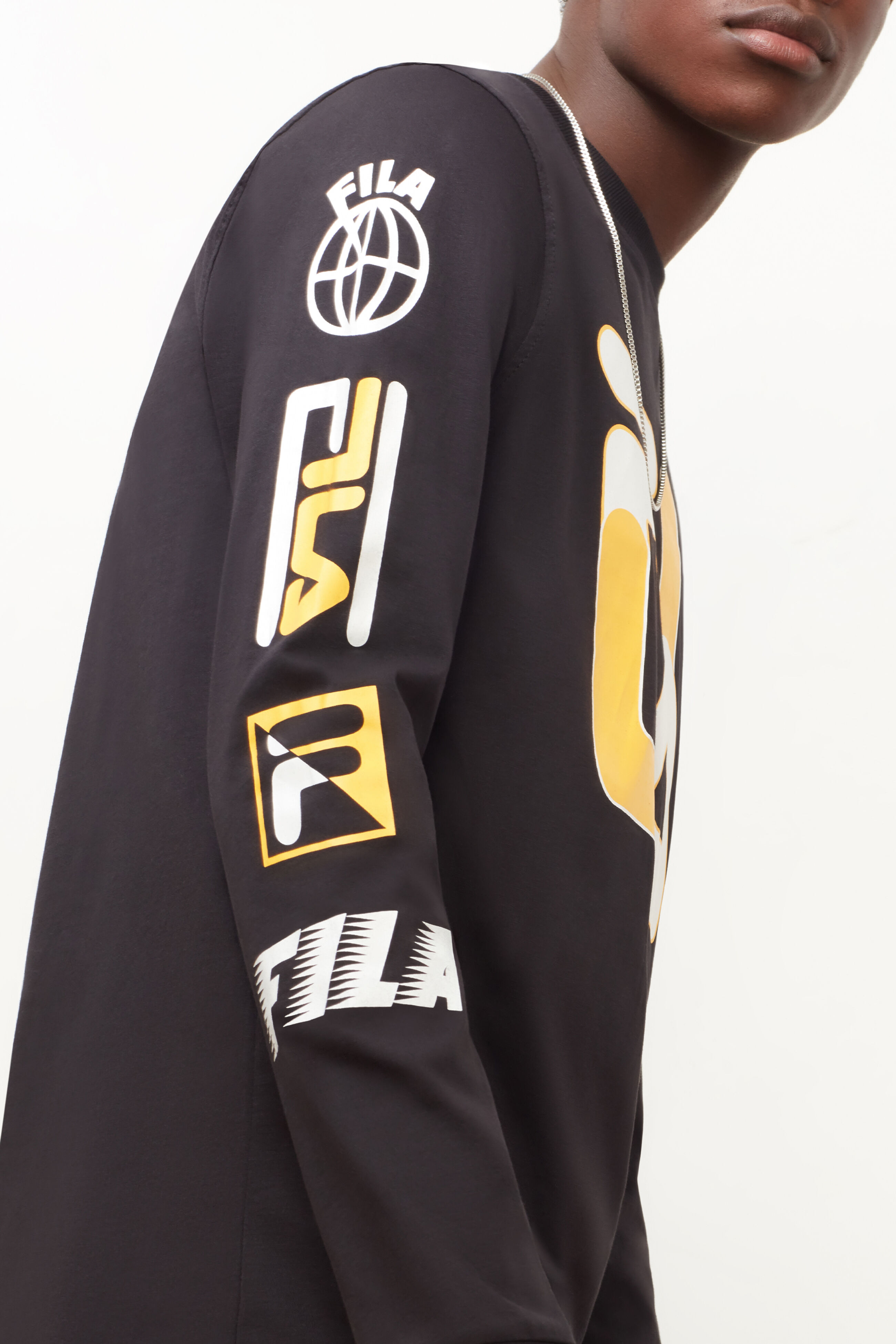 Black and gold fila hotsell shirt